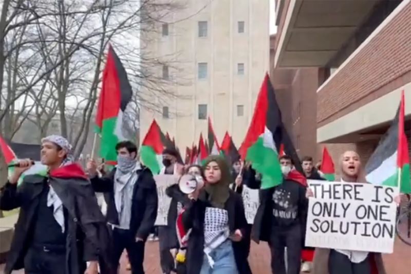 Pro-Palestinian protesters at the University of Michigan chanted "long live the Intifada" and held a sign saying "there is only one solution." @blakeflayton/Twitter
