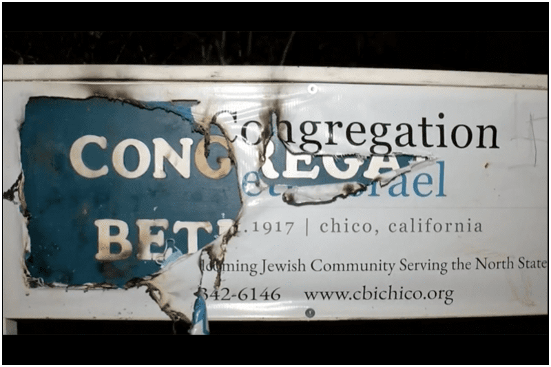 Vandals burned and drew swastikas and SS bolts on a sign outside Congregation Beth Israel in Chico on November 2, 2022. (Screenshot/Action News Now)